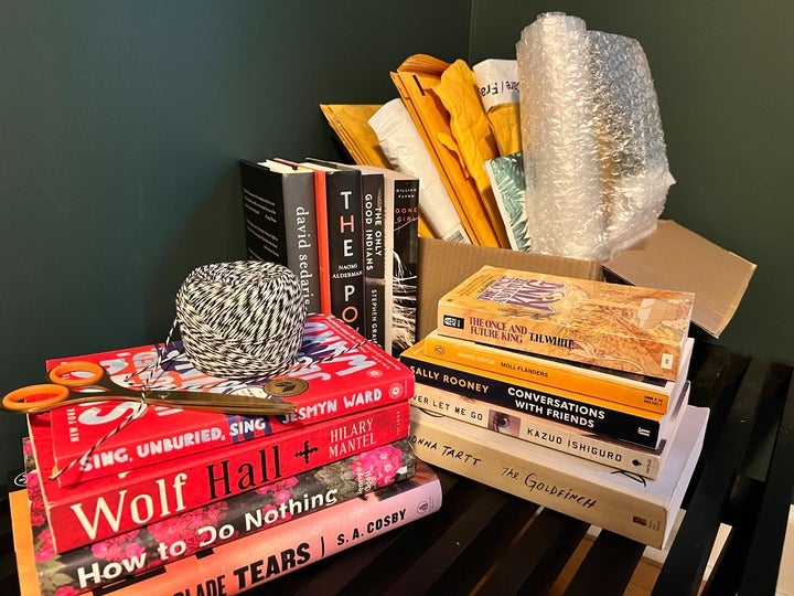 Stacks of books with packing material