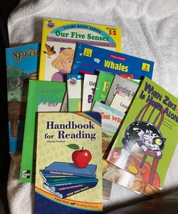 An assortment of 1st-3rd grade level reading books and textbooks #50