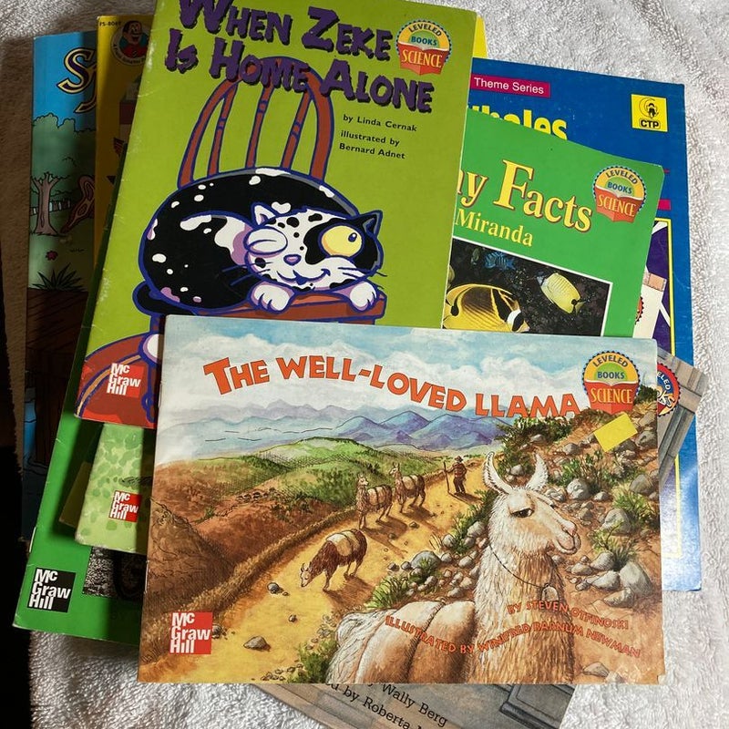 An assortment of 1st-3rd grade level reading books and textbooks #50