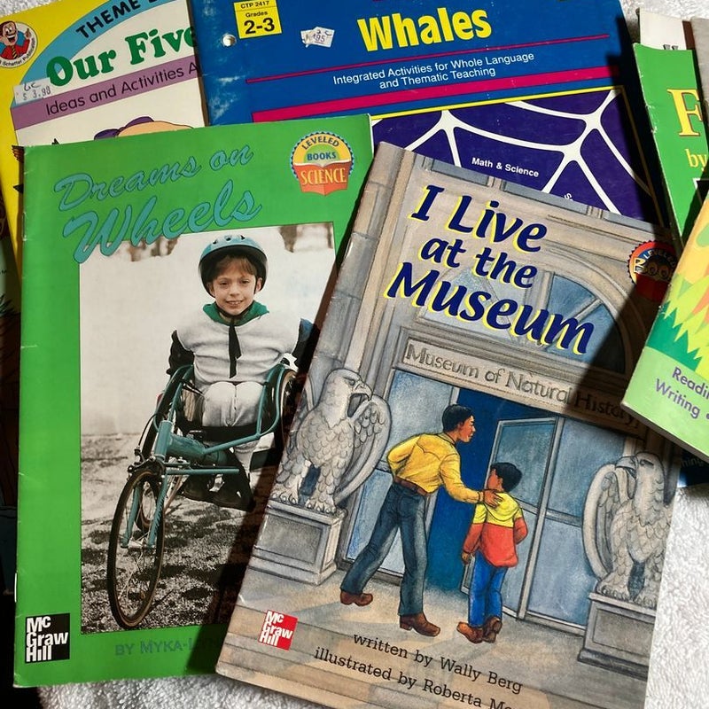 An assortment of 1st-3rd grade level reading books and textbooks #50