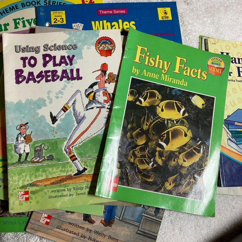 An assortment of 1st-3rd grade level reading books and textbooks #50