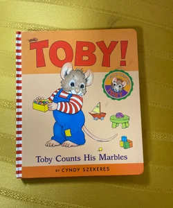 Toby Counts His Marbles 