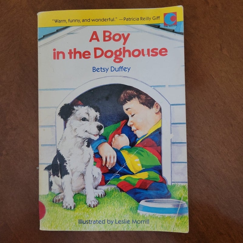 A Boy in the Doghouse