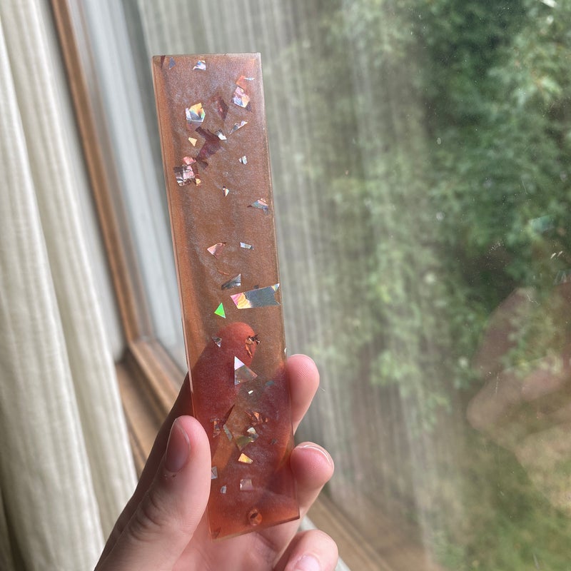5.55” by 1.81” silver foil with color change resin bookmark