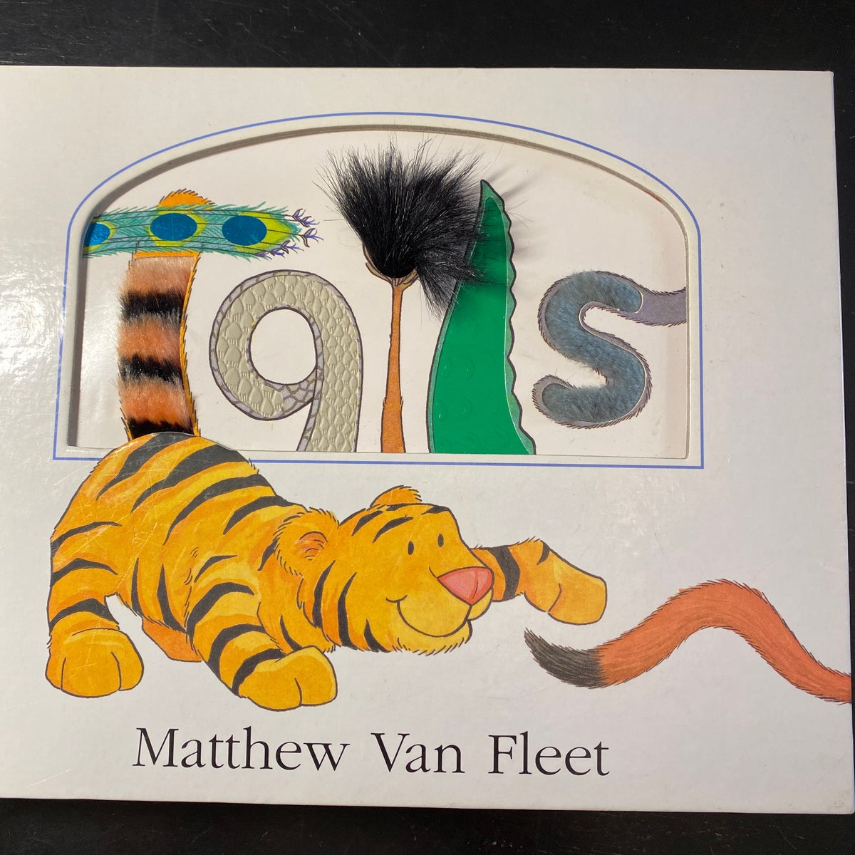 Tails by Matthew Van Fleet