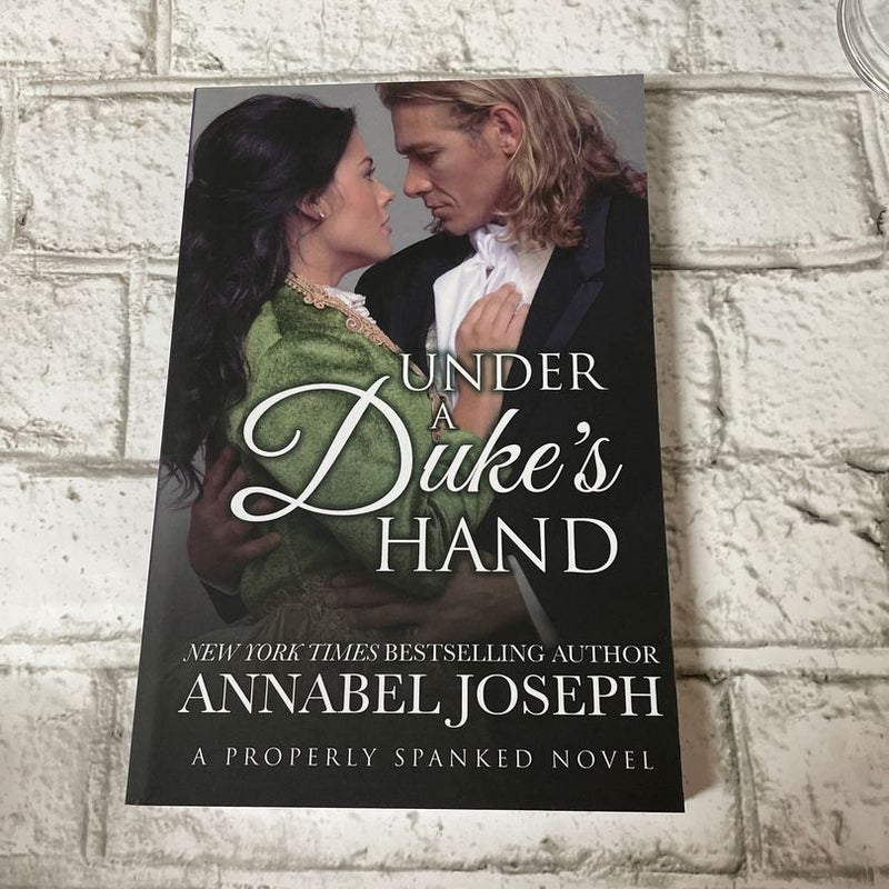 Under a Duke's Hand