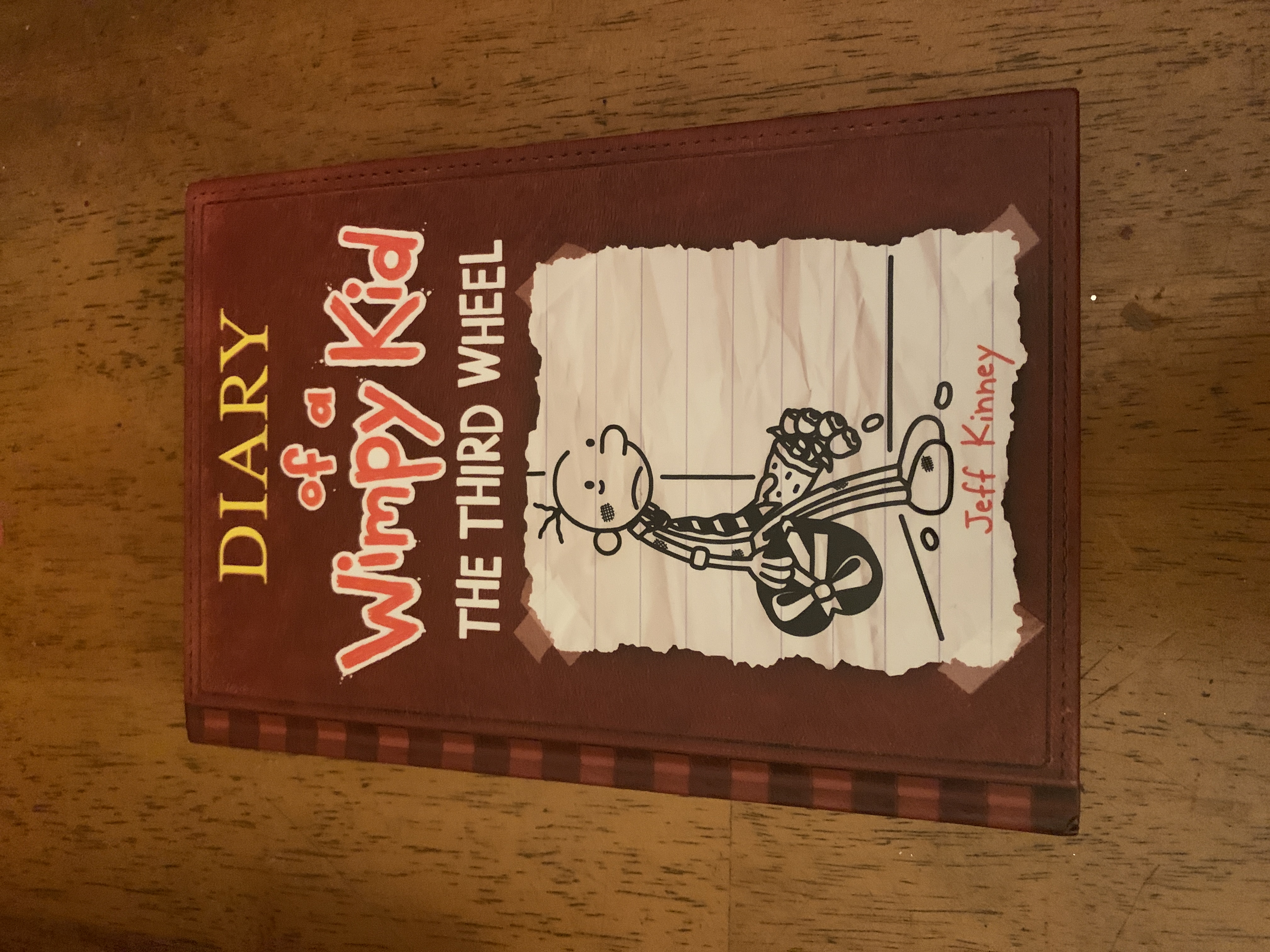 The Third Wheel (Diary of a Wimpy Kid, Book 7) book cover