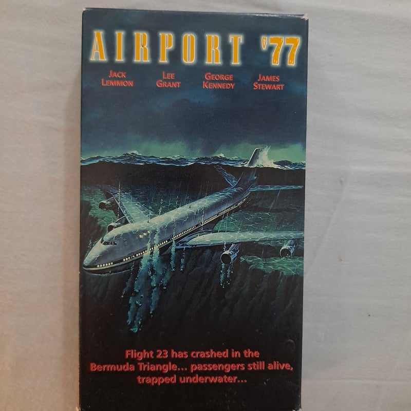 Airport 77 VHS tape with original case by Universal film, Paperback