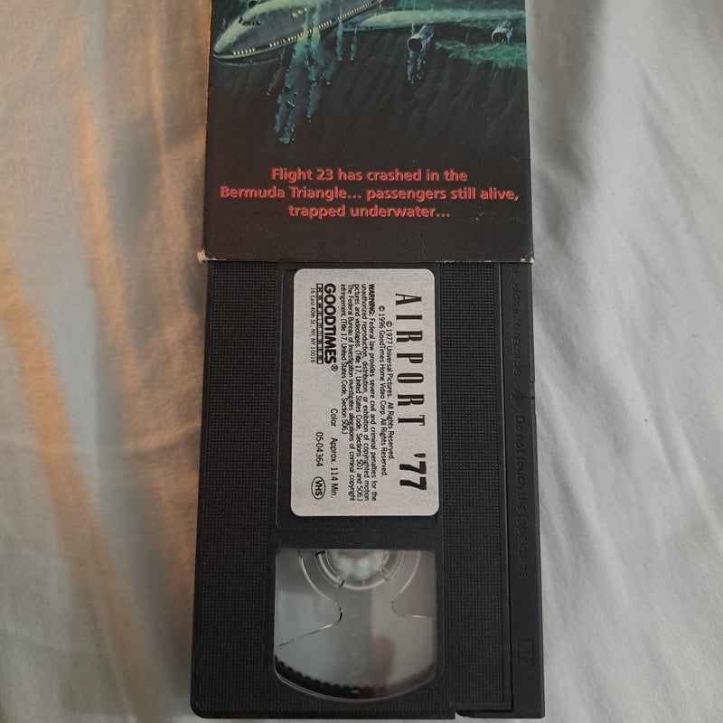 Airport 77 VHS tape with original case by Universal film, Paperback