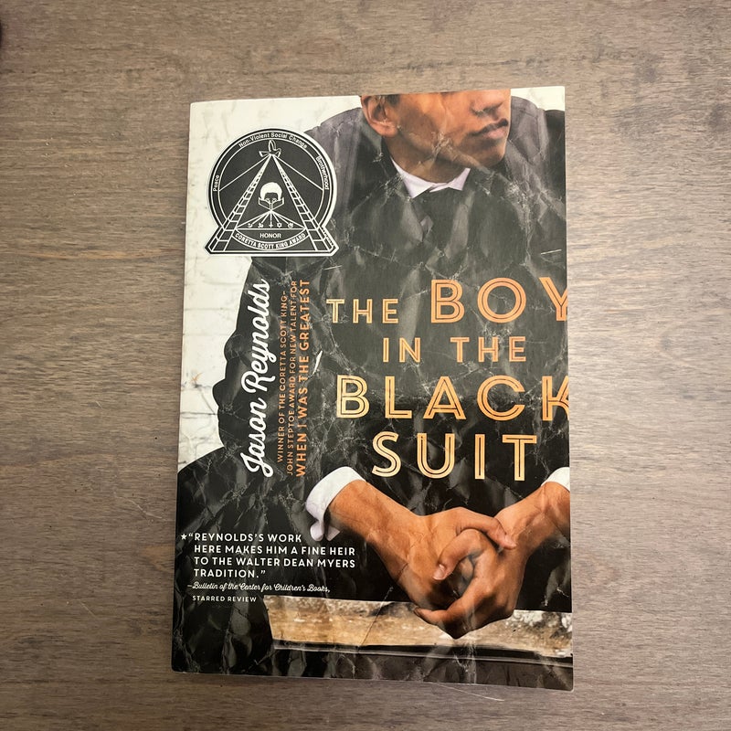 The Boy in the Black Suit