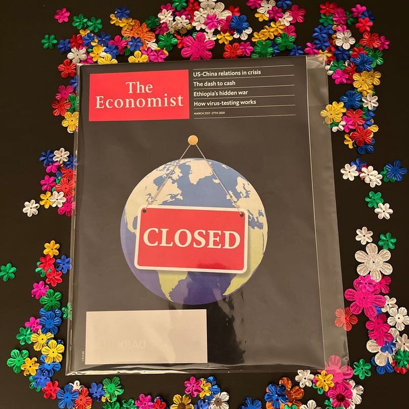 Closed Magazine (comes with protective sleeve) 