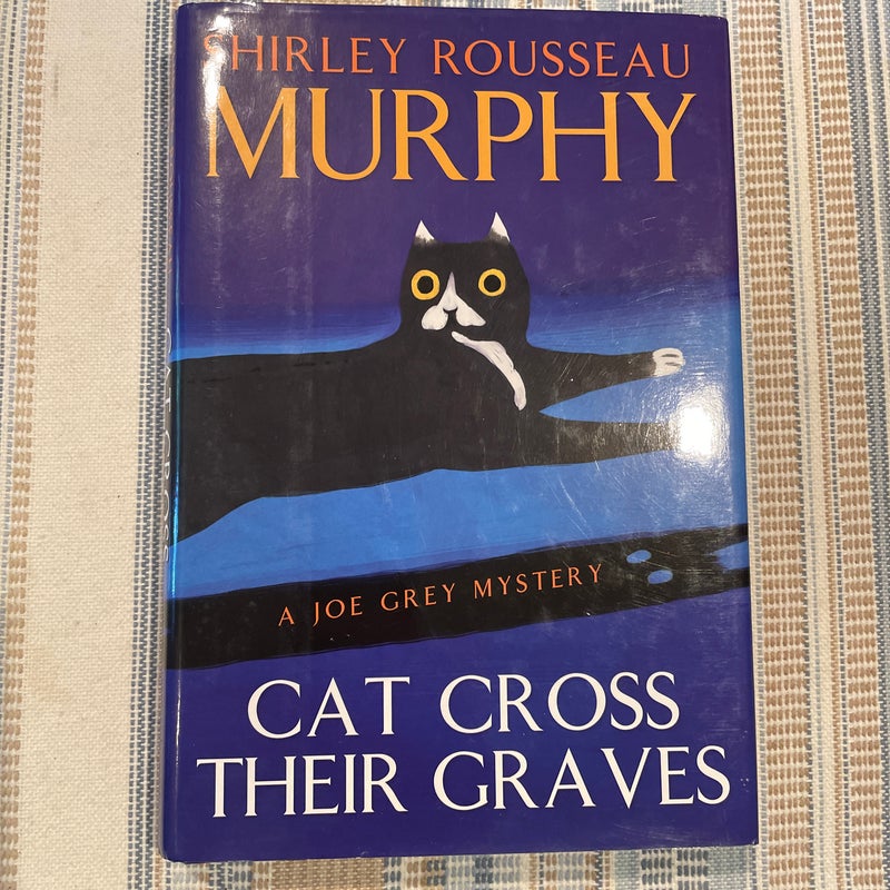 Cat Cross Their Graves