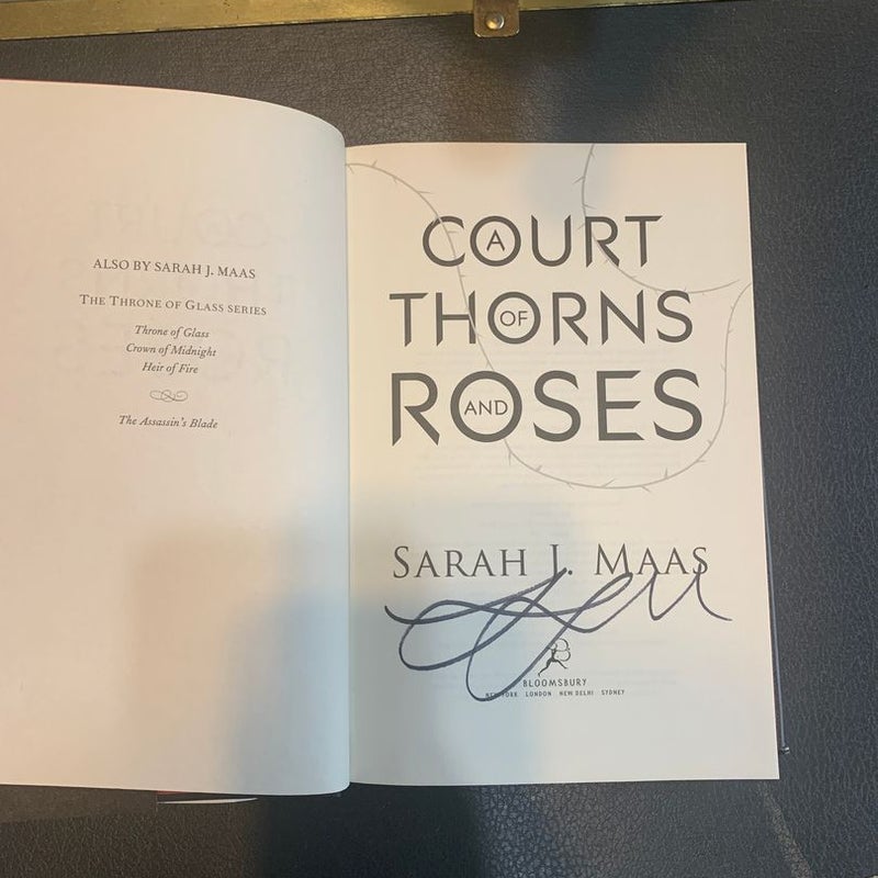 A Court of Thorns and Roses (signed first edition original cover)