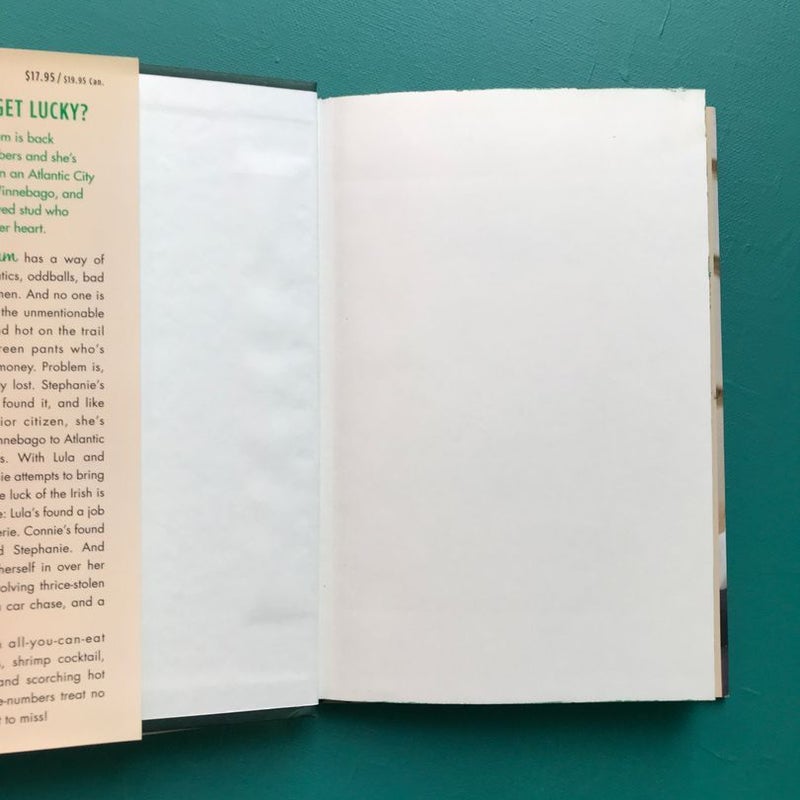 Plum Lucky— novel with green Sprayed Edges