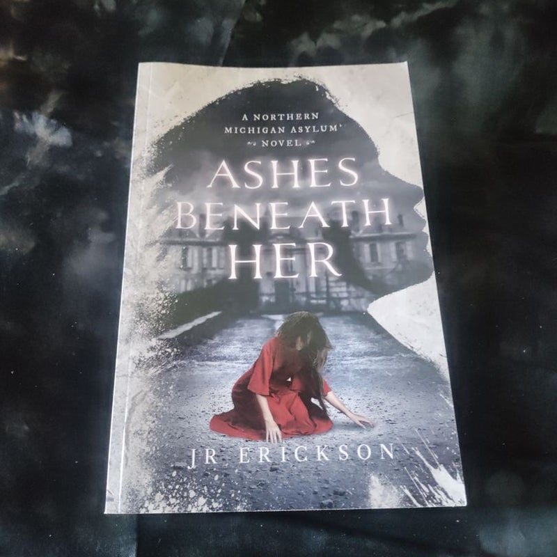 Ashes Beneath Her