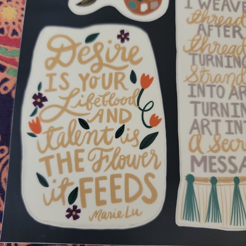 Owlcrate sticker sheet with quotes from  Winter song, The kingdom of black, And Woven in moonlight. 