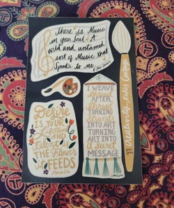 Owlcrate sticker sheet with quotes from  Winter song, The kingdom of black, And Woven in moonlight. 