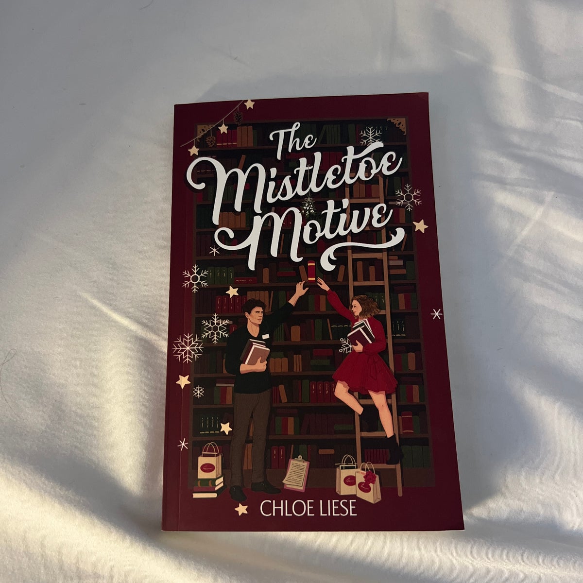 The Mistletoe Motive by Chloe Liese