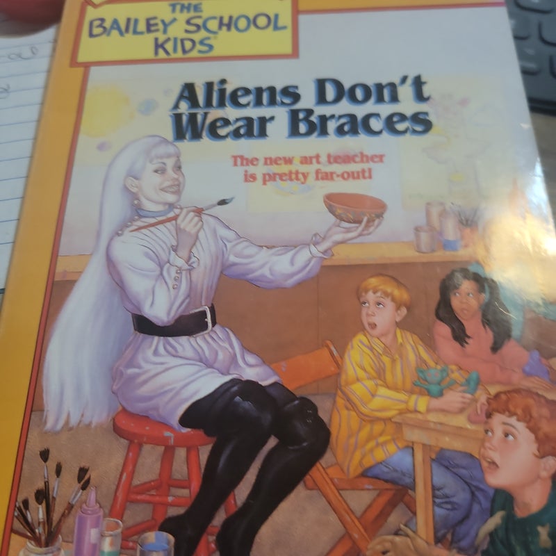 Aliens don't wear braces
