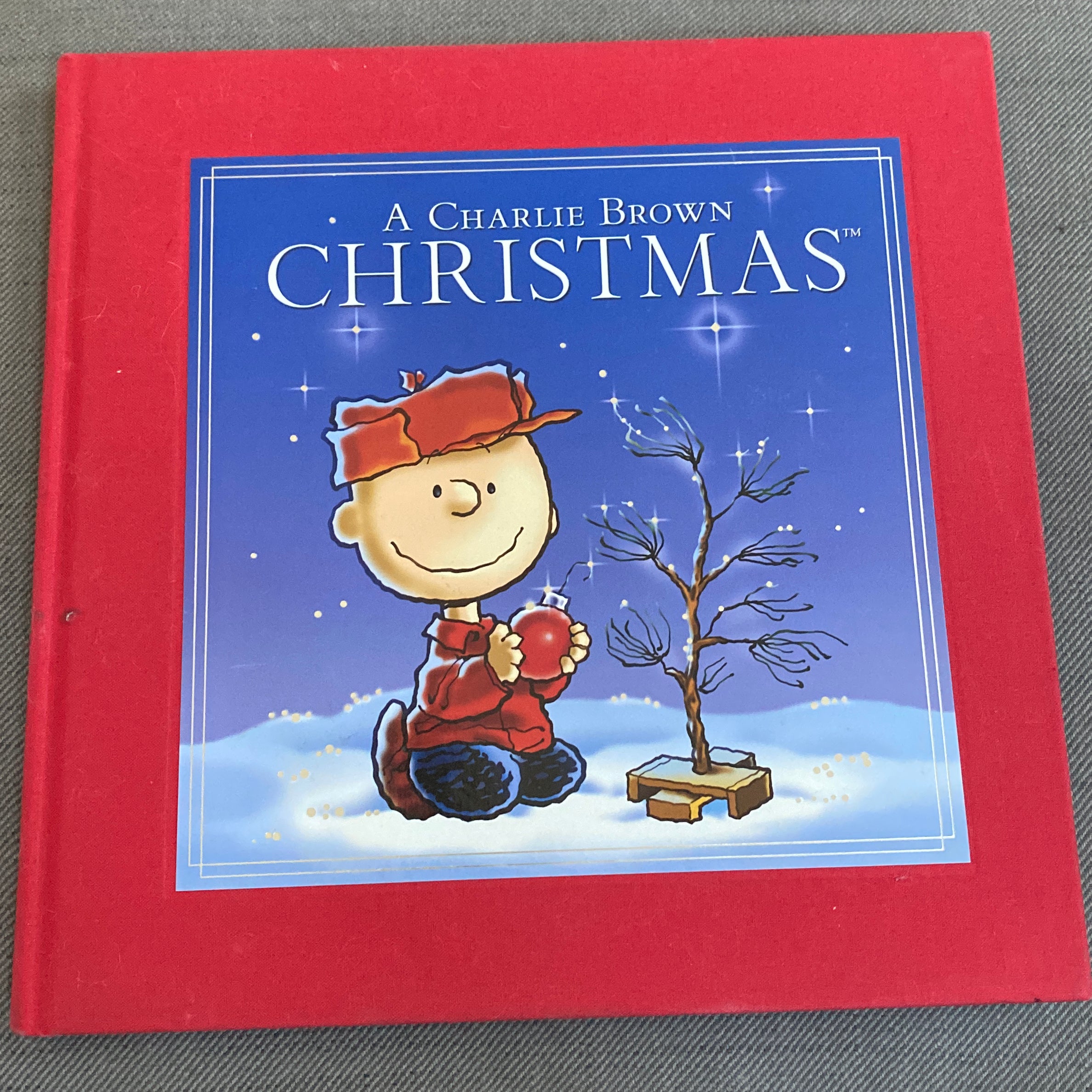 Peanuts: a Charlie Brown Christmas Deluxe Ed