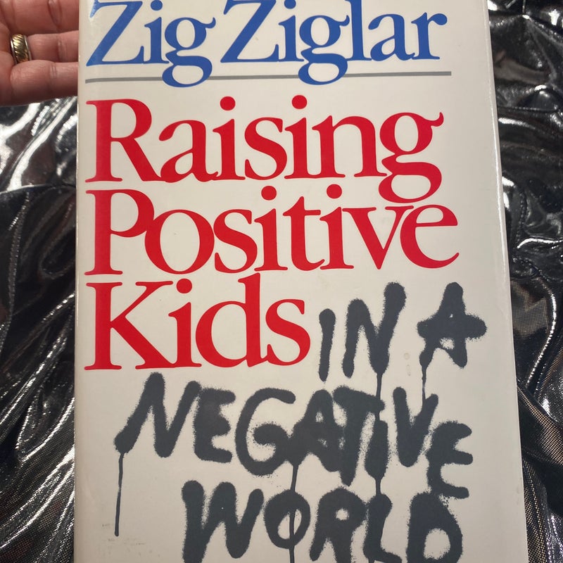 Raising Positive Kids in a Negative Worldby 