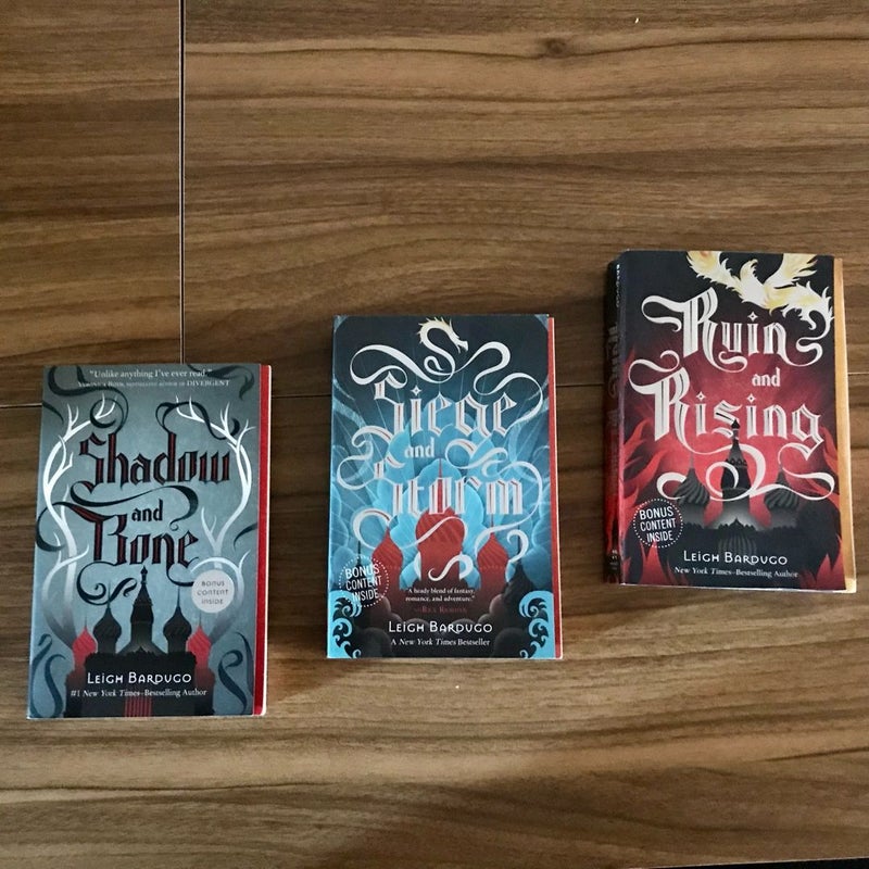Grisha Trilogy by Leigh Bardugo (Book 1: Shadow and Bone, Book 2: Siege and Storm, and Book 3: Ruin and Rising) 
