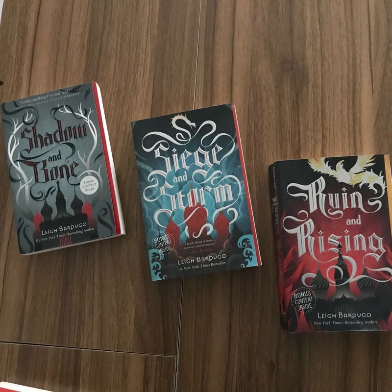 Grisha Trilogy by Leigh Bardugo (Book 1: Shadow and Bone, Book 2: Siege and Storm, and Book 3: Ruin and Rising) 