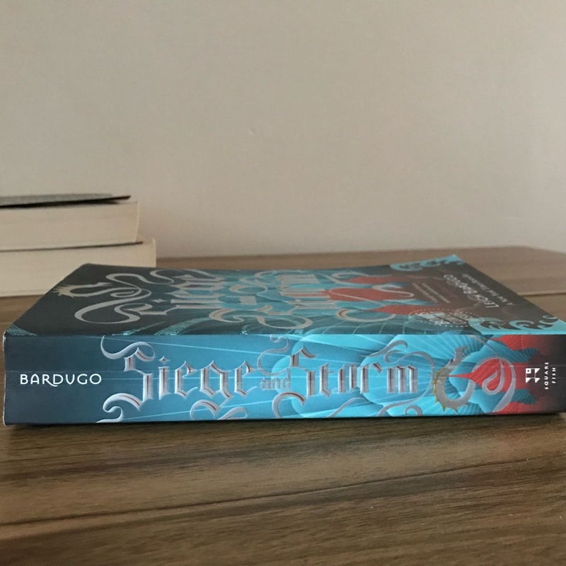 Grisha Trilogy by Leigh Bardugo (Book 1: Shadow and Bone, Book 2: Siege and Storm, and Book 3: Ruin and Rising) 