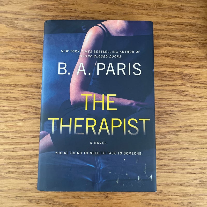 The Therapist (one mark on bottom of book-see photo) 