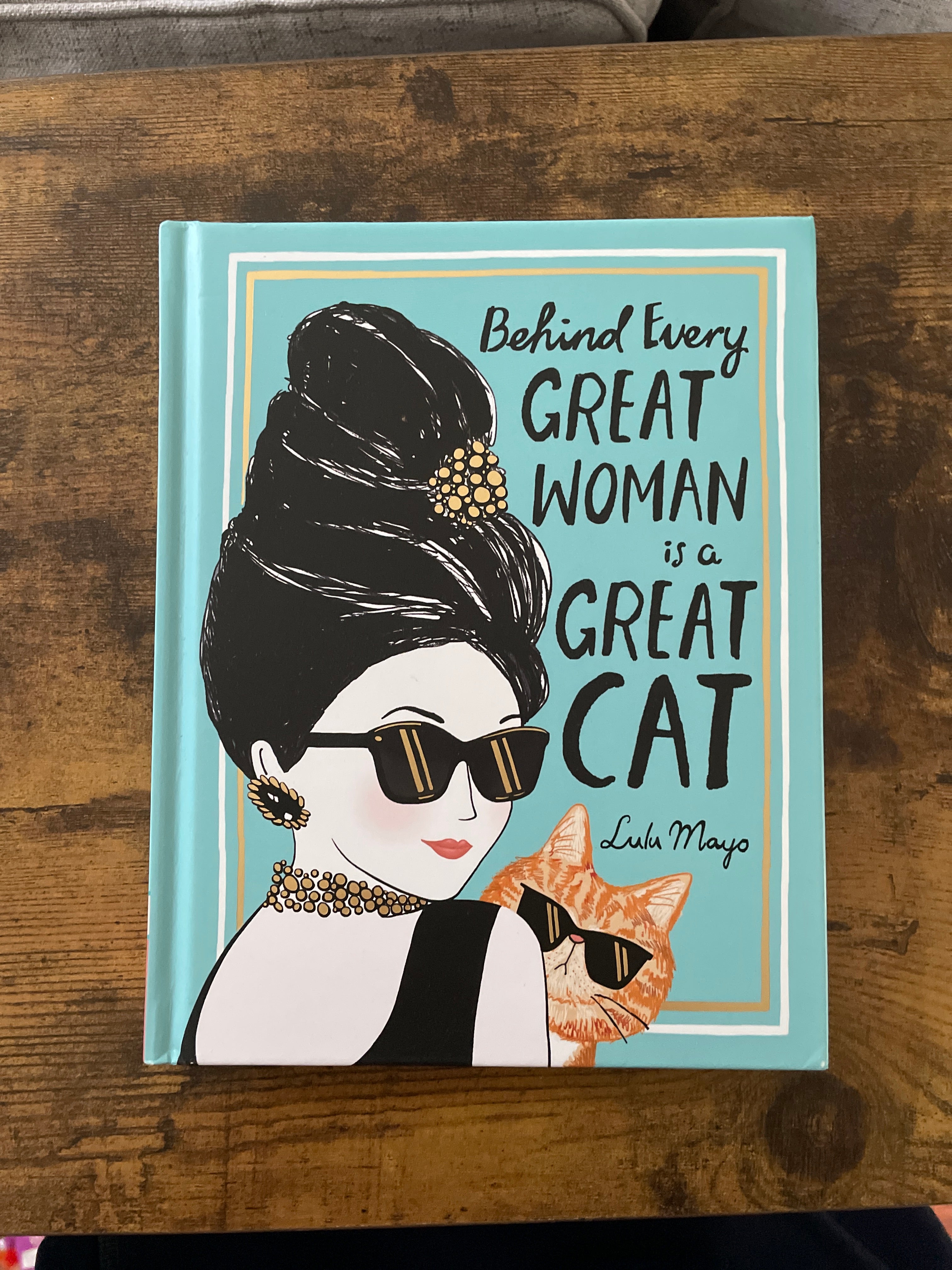 Behind Every Great Woman Is a Great Cat