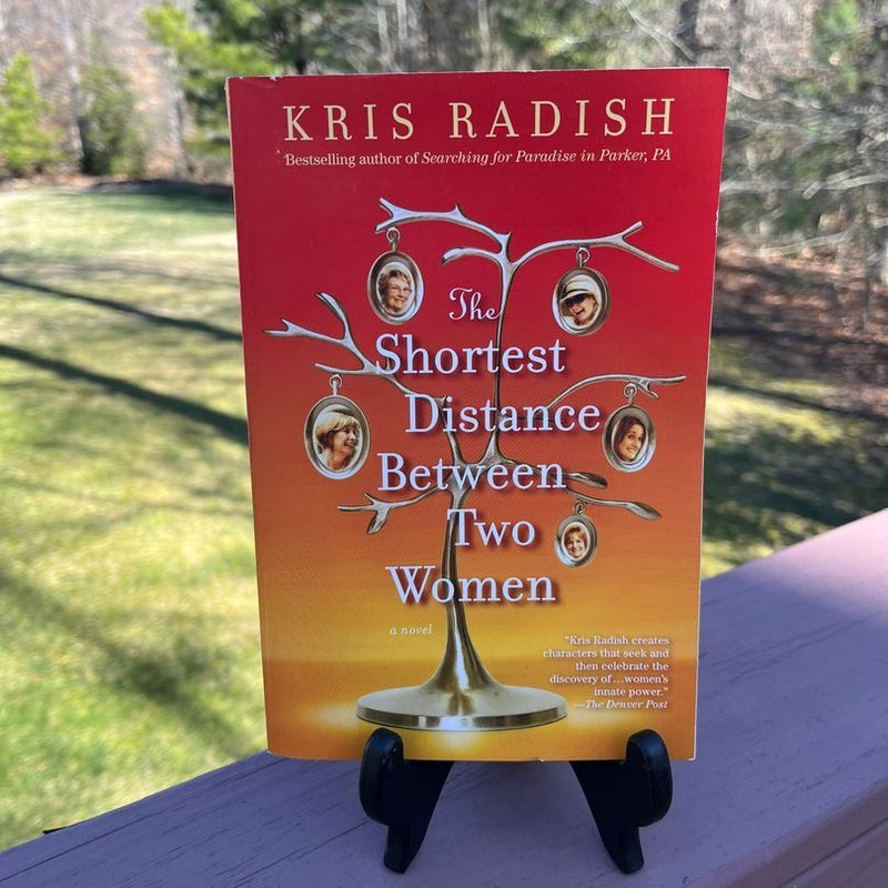 the-shortest-distance-between-two-women-by-kris-radish-paperback