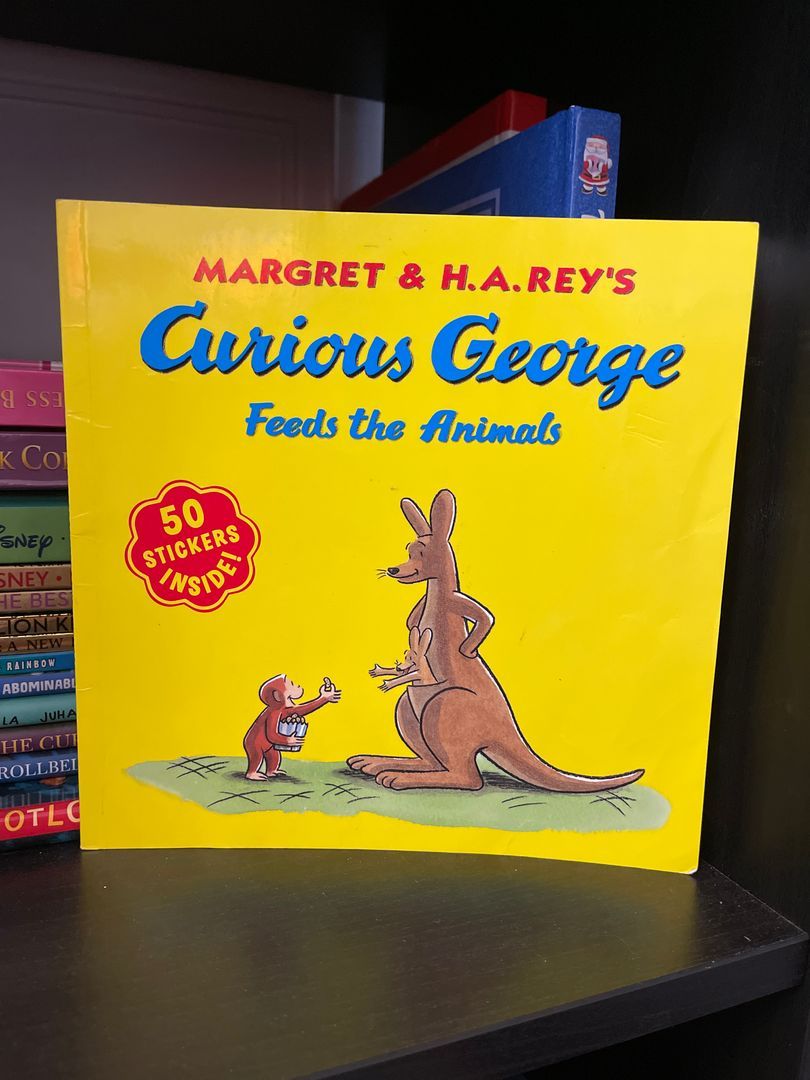 Curious George Feeds the Animals (8x8 with Stickers)