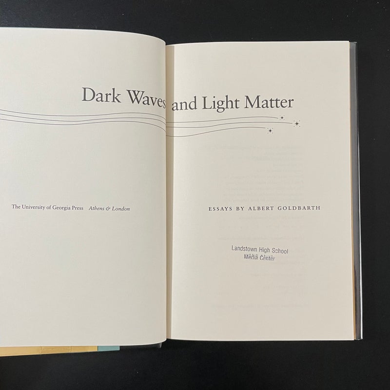 Dark Waves and Light Matter: Essays