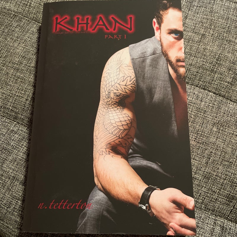 Khan (signed)