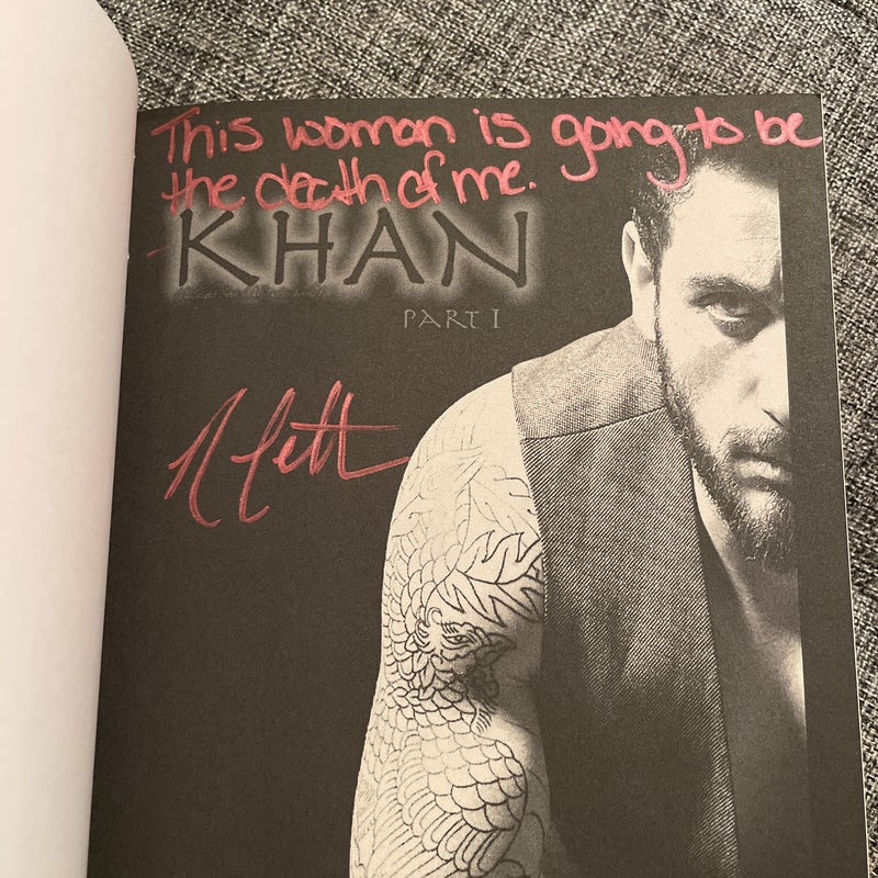 Khan (signed)