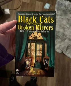 Black Cats and Broken Mirrors