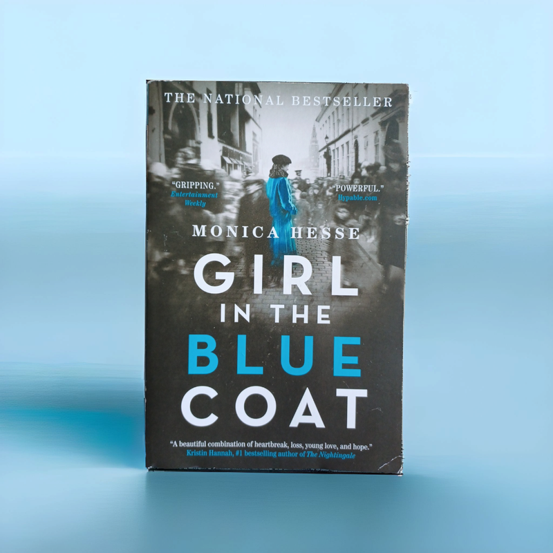 Girl in the Blue Coat Softcover Book