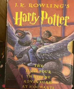 Boxed Set Harry Potter Paperback  (Books 1-4) Scholastic copyright  1999