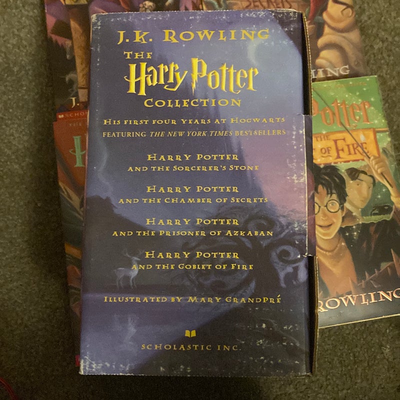 Boxed Set Harry Potter Paperback (Books 1-4) Scholastic copyright 1999 by  J. K. Rowling, Paperback