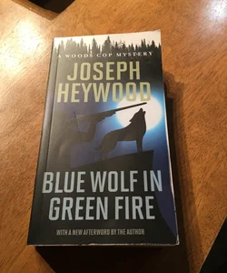 Blue Wolf in Green Fire (A Woods Cop Mystery)