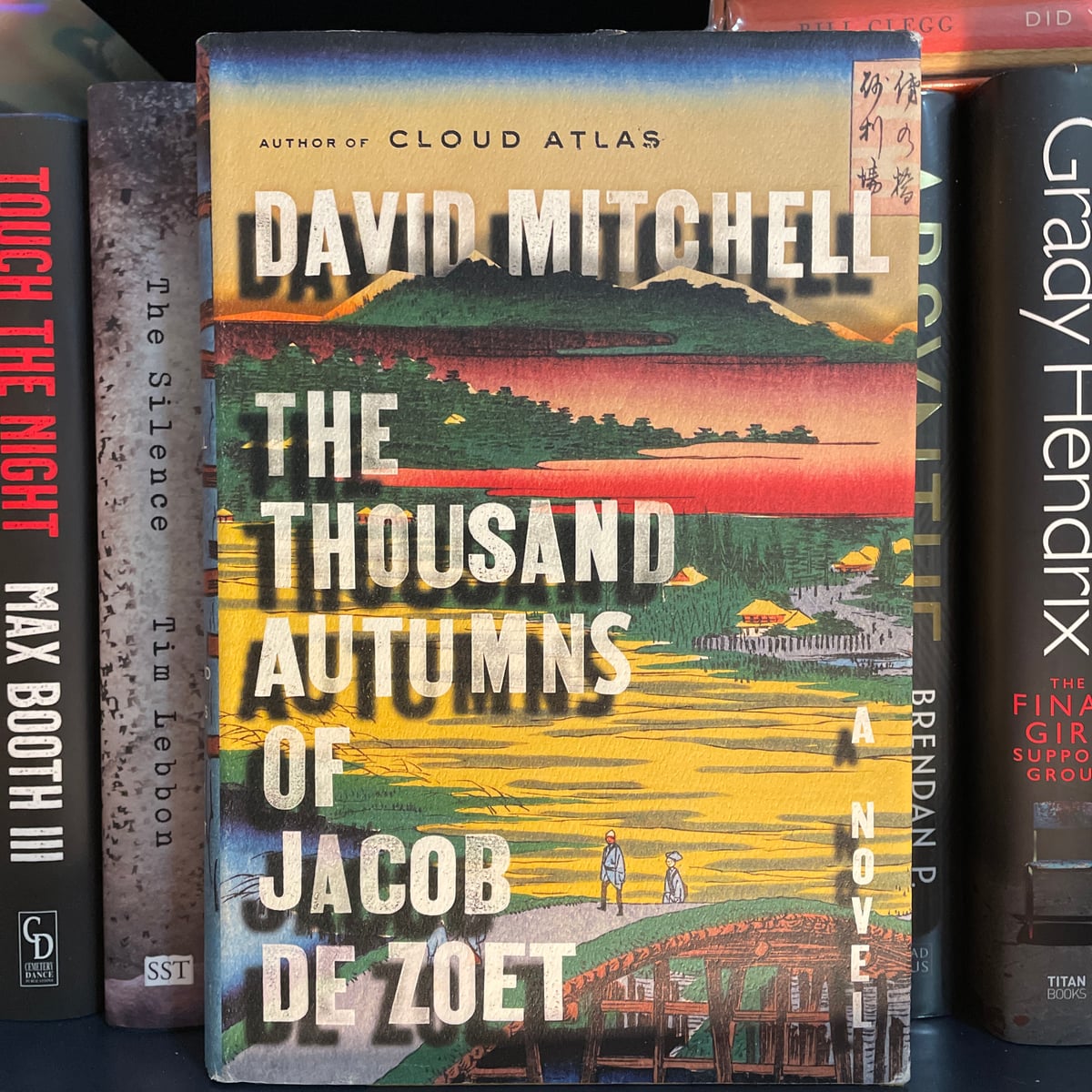 Illustration of The Thousand Autumns of Jacob de Zoet book cover with Japanese motifs