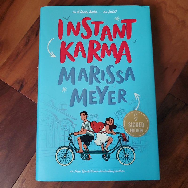 Instant Karma signed edition