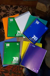 Assorted school notebooks and folders