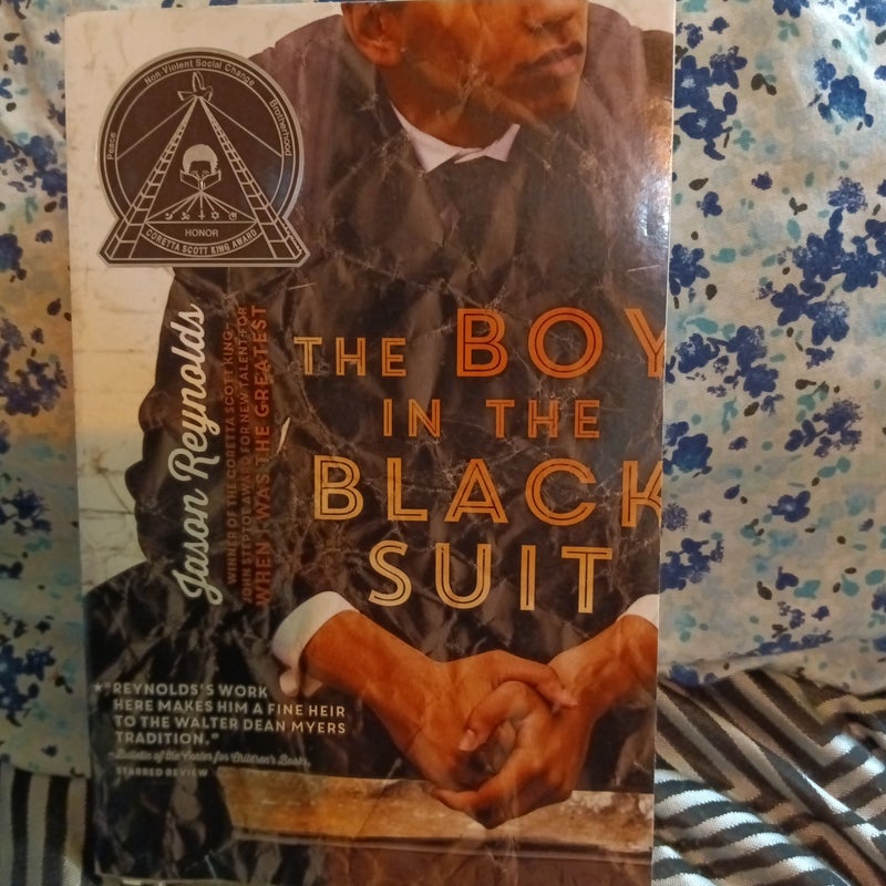 The Boy in the Black Suit