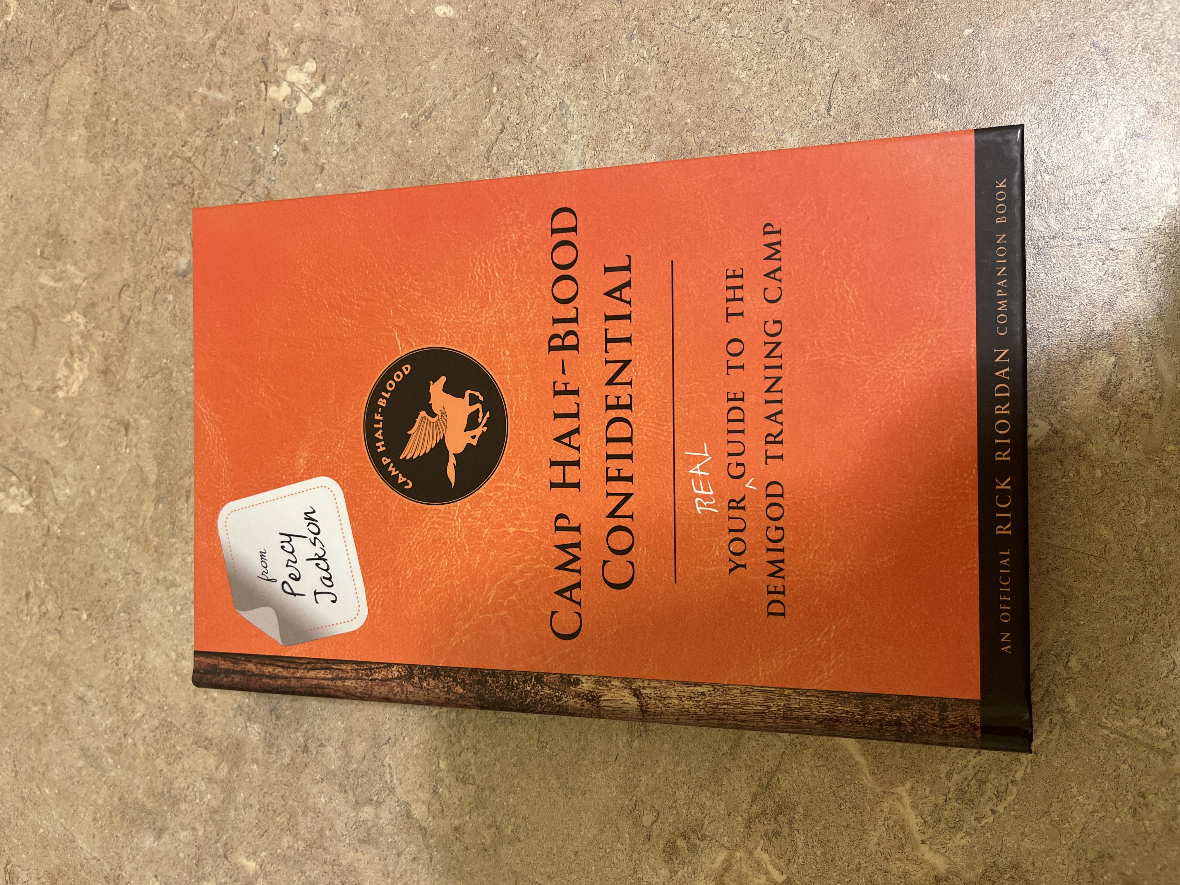 From Percy Jackson: Camp Half-Blood Confidential - Rick Riordan Hardcover VERY GOOD