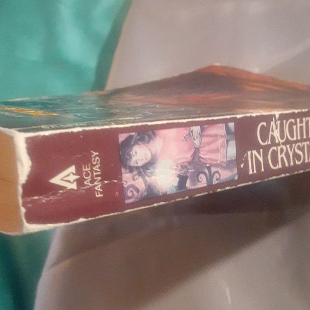 Caught in Crystal : A Lyra Novel by Patricia C. Wrede