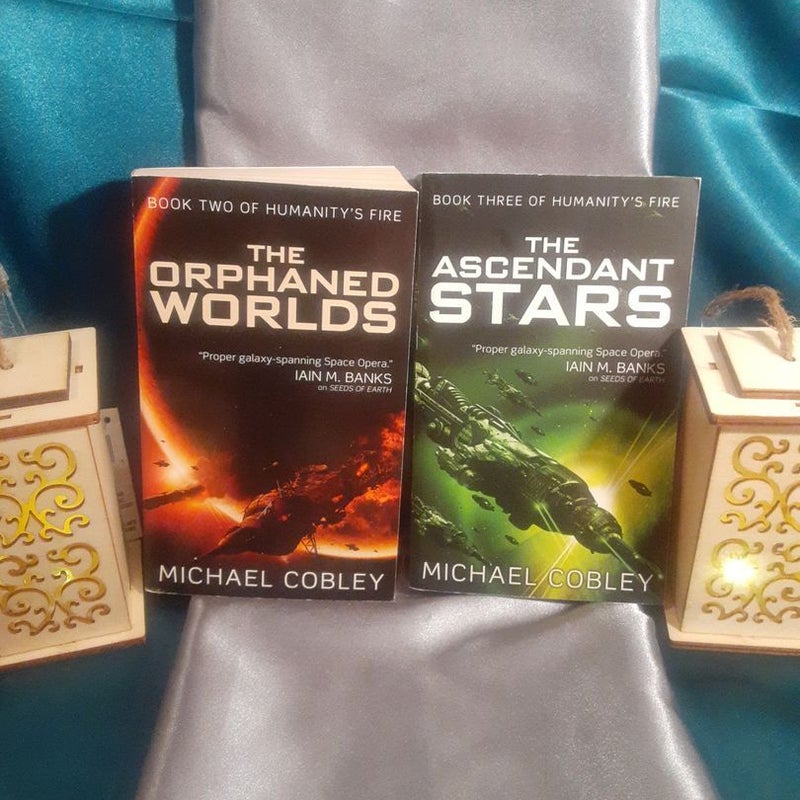 Humanity's Fire books 2 & 3: The Orphaned Worlds, The Ascendant Stars by Michael Cobley