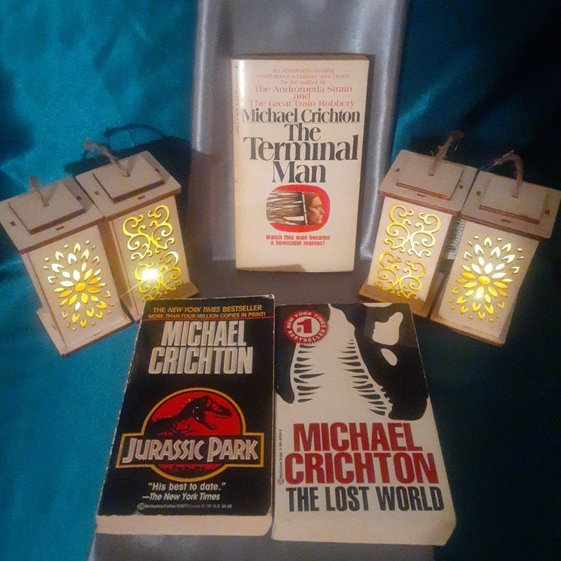 3 books by Michael Crichton, The Terminal Man, Jurassic Park 1 & 2 The Lost World, Mass market paperback books