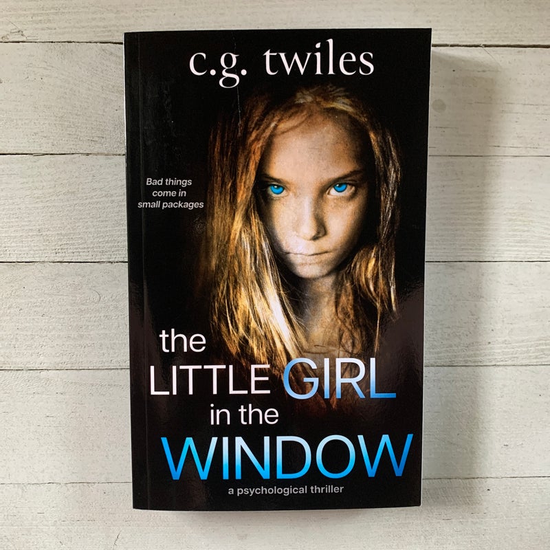 The Little Girl in the Window