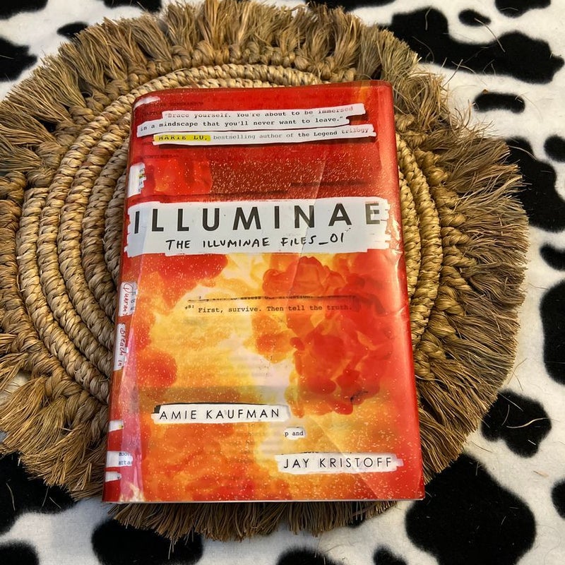 Illuminae- dust jacket creased 